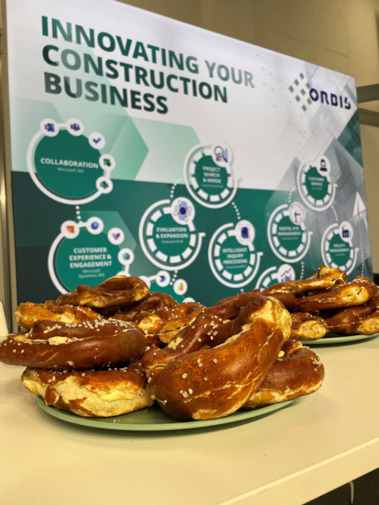 Echte bayrische Brezn in Szene gesetzt vor der ORBIS Rückwand Standverpflegung Brezn auf der BAU