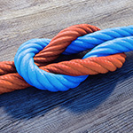 Customer Relationship Management (CRM) Webinar für SAP-Anwender Verknotetes Seil als symbolische Verbindung zwischen SAP und Microsoft